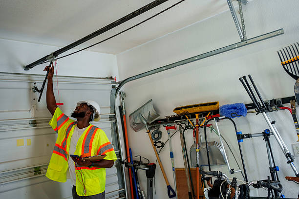 Professional Garage Door technician working in Spring Arbor, MI